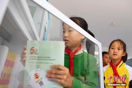 资料图:女小学生。章岱 摄