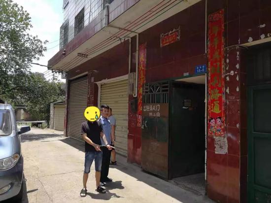 廖某指认现场