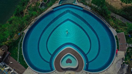 茅岩河温泉民宿以爱心与矿泉引热养生旅游市场