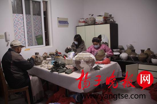 镇江大港龙泉村墓地200余件文物修复完成