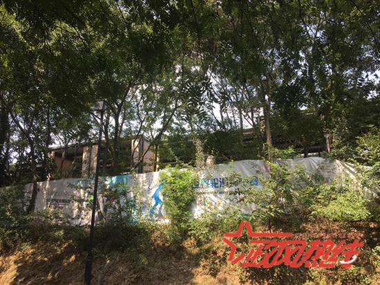 南京聚宝山公园内的这处违建为何迟迟拆不了？