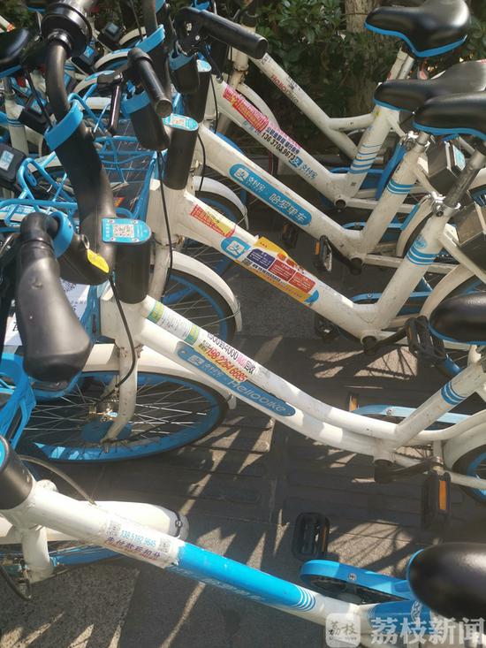 共享单车成小广告新阵地 张贴者：合不合法碍你啥事？