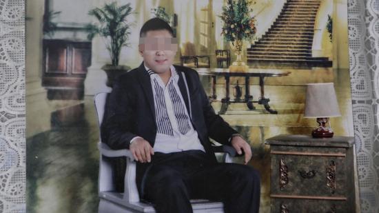 图为黄海龙照片。新京报记者 王嘉宁 翻拍