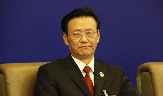 杨克勤资料图。 国际在线图片