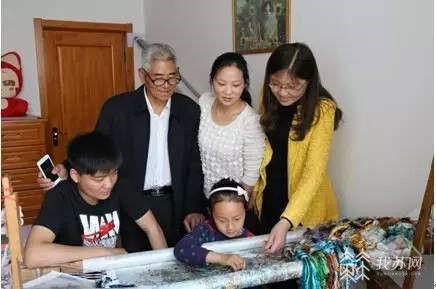 全国人大代表莫元花：针为笔线为墨 巧绣满园春