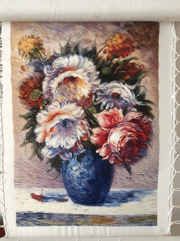 全国人大代表莫元花：针为笔线为墨 巧绣满园春