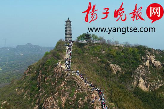 登圌山 百病消 25.6万人赴约镇江东乡“黄明节”