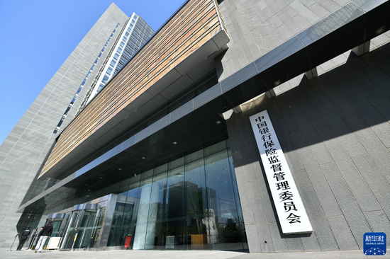 图片来源:新华社发