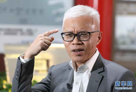 香港故宫文化博物馆馆长吴志华在接受新华社记者专访(4月23日摄)。新华社记者 吴晓初 摄