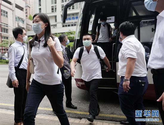 内地核酸检测支援队队员陆续抵达香港九龙维景酒店,准备开始工作(8月28日摄)。 新华社记者 王申 摄