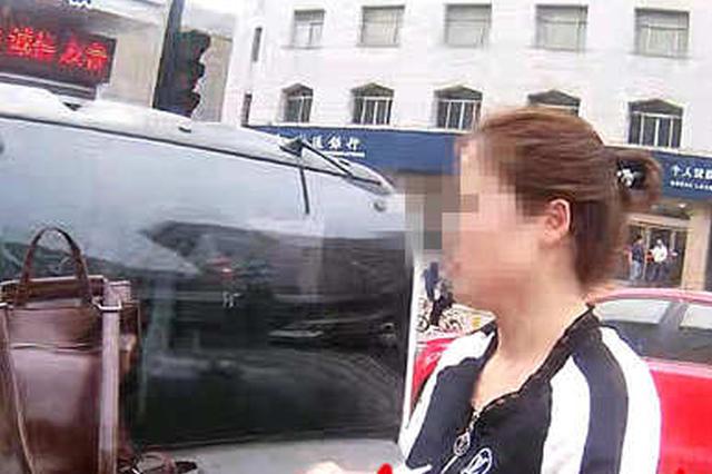 女子违章被查弄伤民警手 居然咬自己称要“两清”