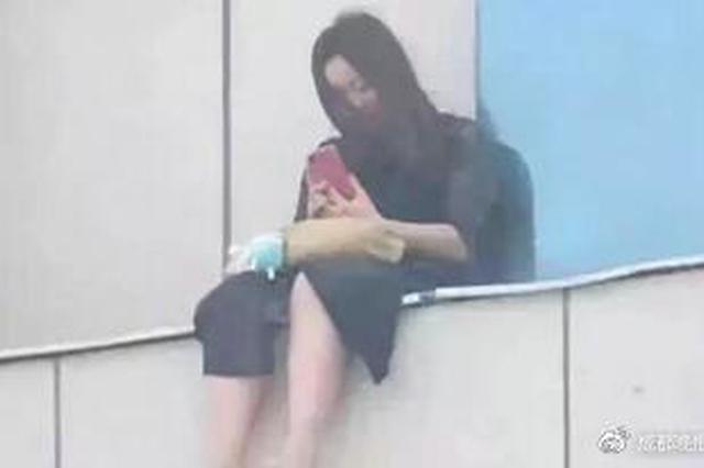 新华社谈甘肃女孩跳楼轻生：法律不会放过起哄者