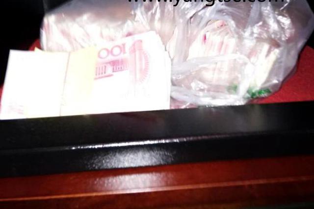 酒店服务员拾到10多万巨款不动心 如数归还失主