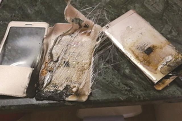 手机充电时“自燃” 厂家：原价赔偿须签保密协议