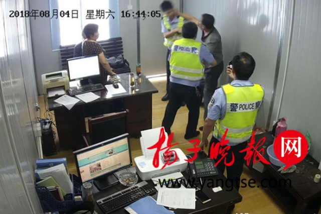 镇江6旬出租车司机酒驾装车后欲逃跑  被查后又袭警
