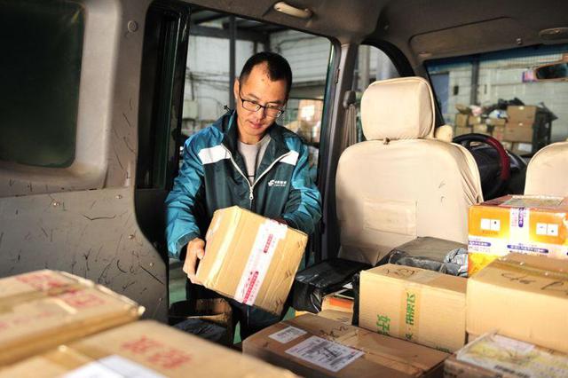 今年“双11”快递包裹将达1.9亿件创新高 机器人当助手