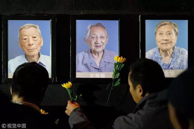 南京大屠杀国家公祭日:幸存者照片墙灯又灭三盏