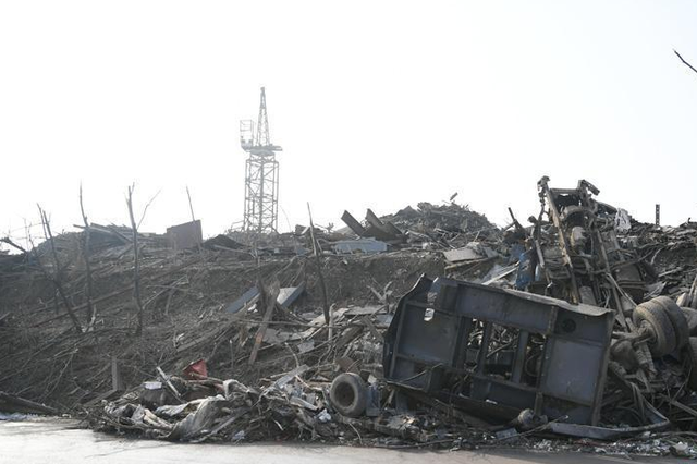 儿子引发火灾母亲卖菜还赔偿款7年 债权人弃赔偿