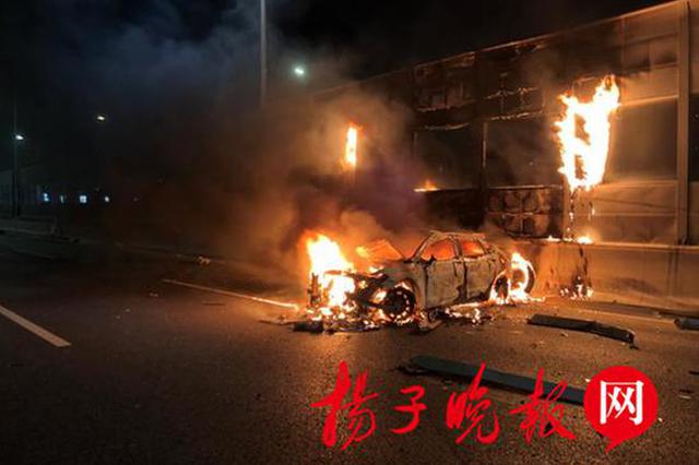 泰州一轿车与货车相撞起火 轿车司机自救无果后竟跑了