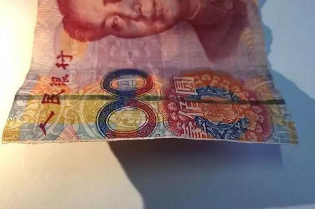 黑车司机造假币赚钱获刑 将假币掉包偷换给乘客