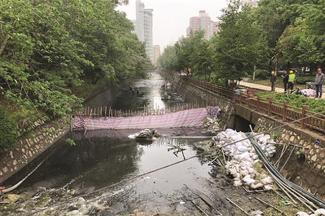 江苏水污染执法回头看 南京闹市区藏着“黑水河”