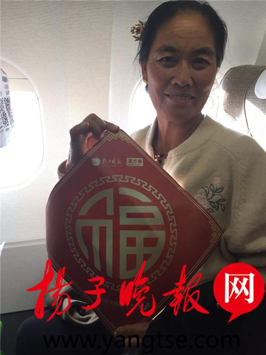 公留在家里等儿子 妈妈带着家乡味道去南京陪