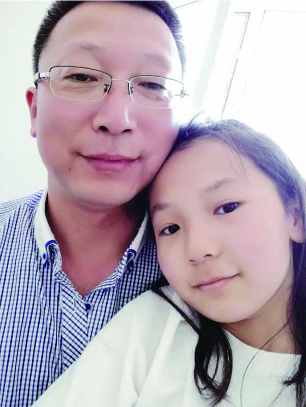 孙宏志和女儿的合影。(图片由孙宏志本人提供)