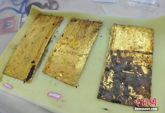 资料图:海昏侯主棺内发现的金器。图片来源:视觉中国
