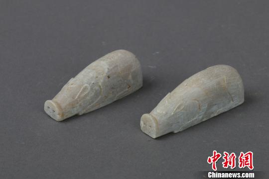 图为考古挖掘出土的文物滑石猪。 彭伟楸 摄