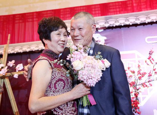 参加活动的王康尧夫妇 杨洋 摄
