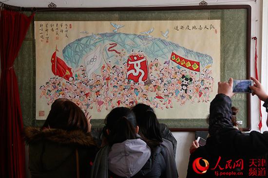 东丰台木版年画《欢天喜地庆奥运》。孙一凡/摄