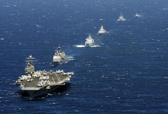 面对美军3艘航母围堵中国能否应付?两年后会