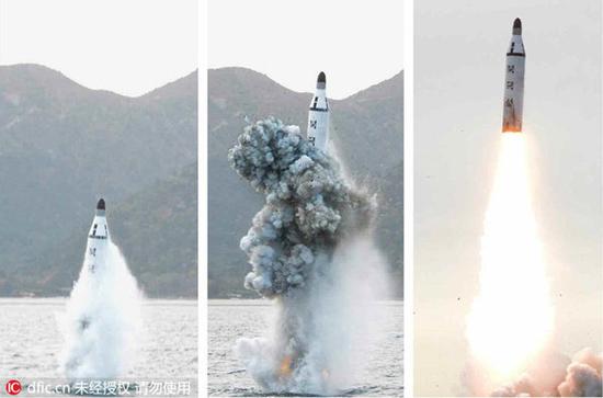 图为朝鲜公开潜射弹道导弹试射照。