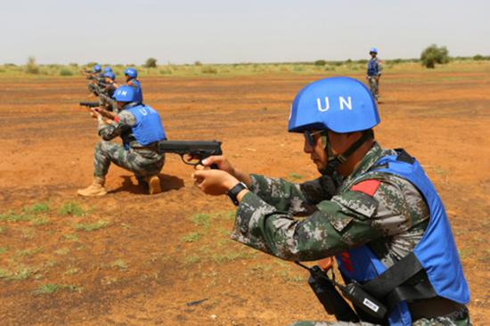 �����ﱱ�����мӰ£��й�ά�Ͳ���ʿ�����ڽ���ʵ��ѵ���������� ����