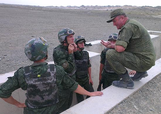 俄军使用中国武器开展训练 92轮战刷上俄国旗(图)