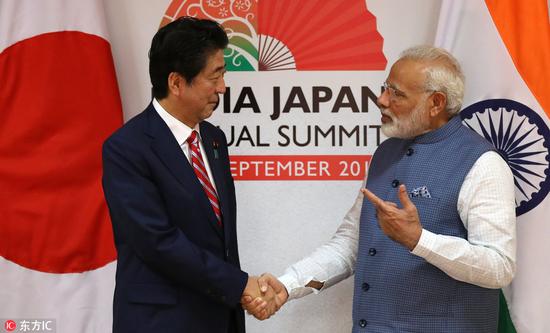 去年9月，日本首相安倍晋三访问印度 @东方IC