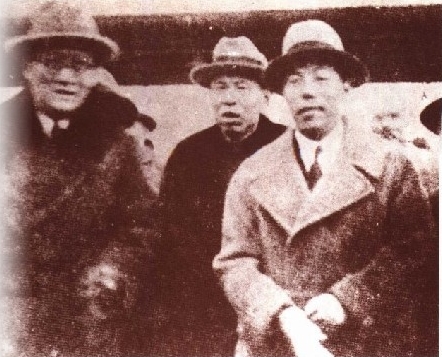 1934年1月8日，张学良(右)回国，吴铁成(左)、杜月笙(中)在上海港口迎接