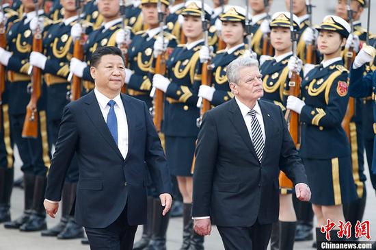 习近平为德国总统高克举行欢迎仪式