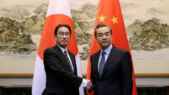 资料图:王毅会见岸田文雄