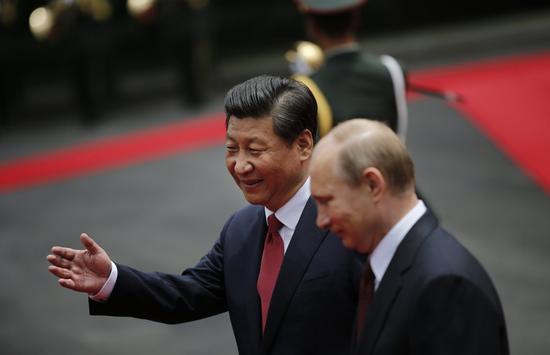 中国国家主席习近平欢迎俄罗斯总统普京访华（资料图）