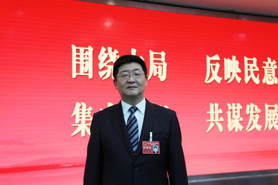 图为姚志坚。何蒋勇摄