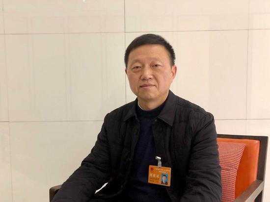 宁波市人民防空办公室主任、党组书记?#28010;?#25935;?#37038;?#20013;新网专访。项菁摄