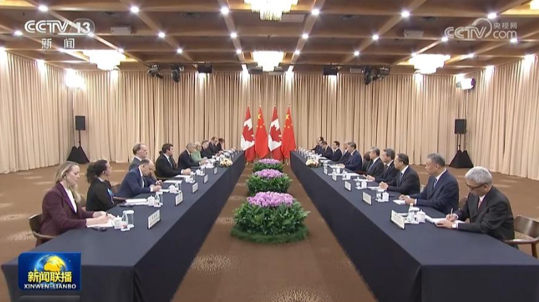 习近平会见加拿大总理卡尼