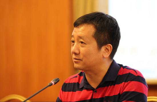 商务部国际贸易经济协作研讨院研讨员 梅新育。(夏宾/摄)
