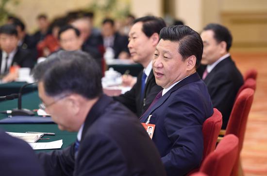2014年3月9日,中共中央总书记、国家主席、中央军委主席习近平参加十二届全国人大二次会议安徽代表团的审议。
