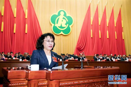 9月14日,中国残疾人联合会第七次全国代表大会在北京人民大会堂开幕。中国残联主席张海迪代表中国残联第六届主席团向大会作工作报告。新华社记者丁林摄