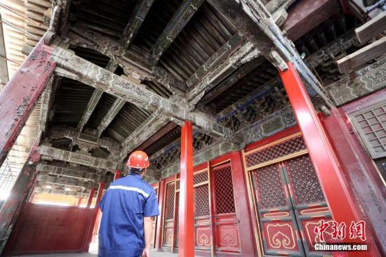 资料图:北京故宫养心殿修缮项目现场。中新社记者 张宇 摄
