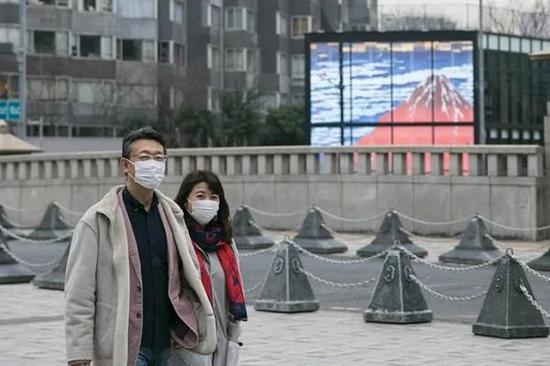 东京街头。图源:新华社