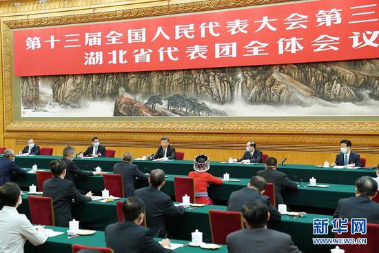 5月24日,中共中心总书记、国度主席、中心军委主席习近平参加十三届天下人大三次集会湖北代表团的审议。 新华社记者 黄敬文 摄