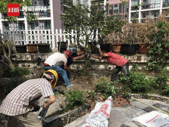 两家邻居“扯皮”十多年,近百平米的楼顶花园才最终被拆除。